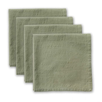 Set of four green napkins on a white background.