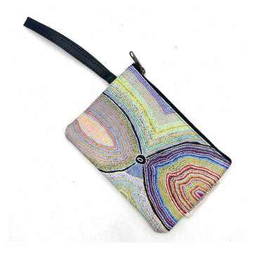 A zippered cosmetic bag with artwork by Liddy Walker on the front and a wrist strap attached at the side.