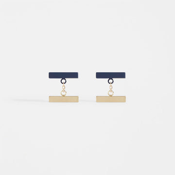 A pair of drop earrings featuring a navy horizontal bar linked to a gold horizontal bar.