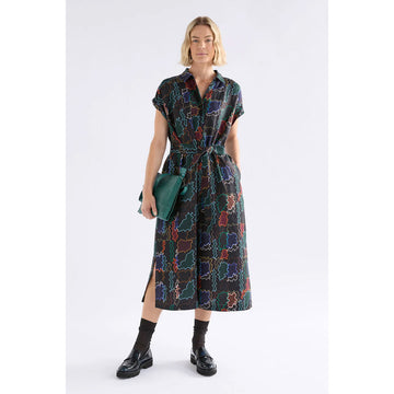 Patterned shirt style dress on a white background.