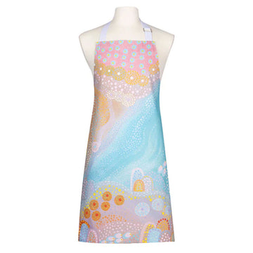An apron printed with colourful artwork by Megan Corby is on a mannequin. 