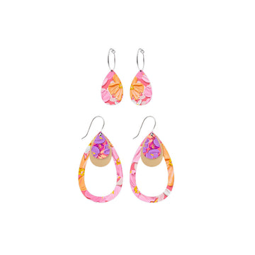 Two pairs of teardrop shaped earrings in different sizes with hoops and hooks and printed with floral artwork by Alex Mason.