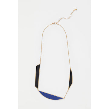 A gold chain necklace with two black and one blue shape linked into the chain.