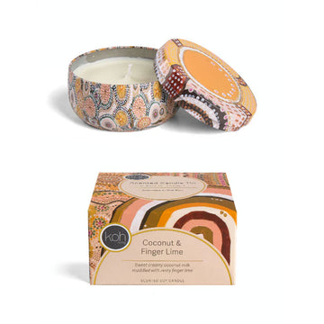 Decorative candle in a patterned tin with matching box on a white background.