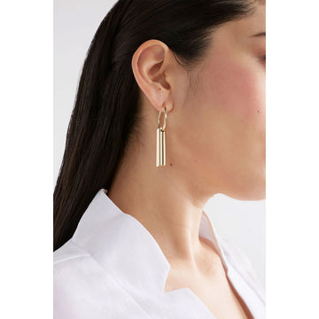 A pair of gold hoop earrings with five gold bars hanging off the hoops.