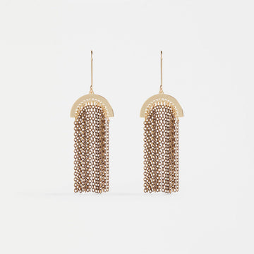 A pair of drop earrings with small bronze delicate chains hanging off an arch shape.