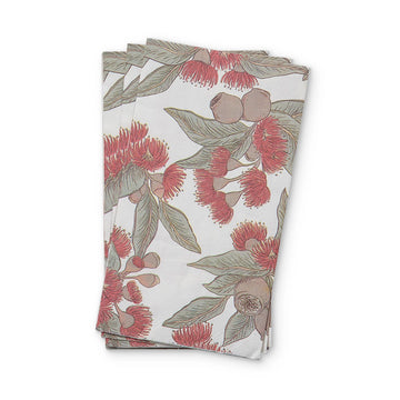 Set of paper napkins with floral design on a white background.