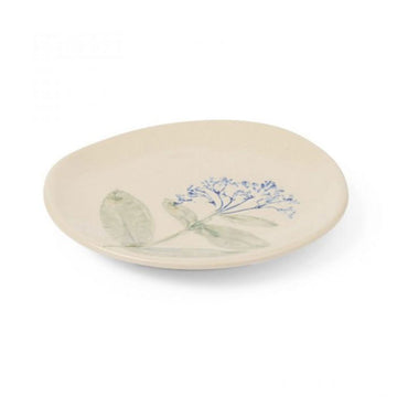 Ceramic plate with floral design on a white background.