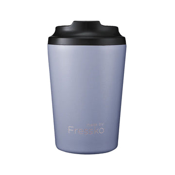 A reusable coffee cup in grape purple with a black lid and the text 'Made by Fressko' along the bottom.