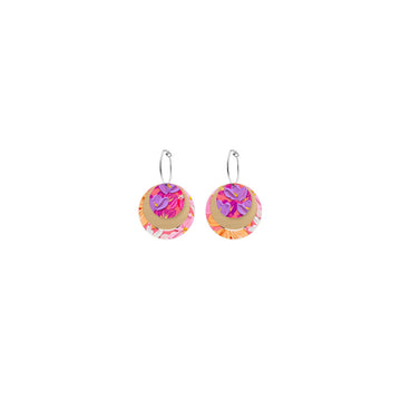 A pair of hoop earrings with three circular shaped hanging off the hoop printed with floral artwork.