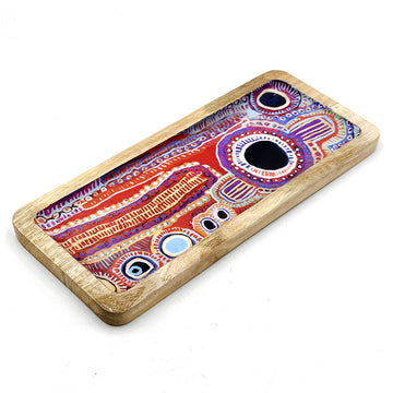 A wooden tray printed with artwork by Murdie Morris in the middle.