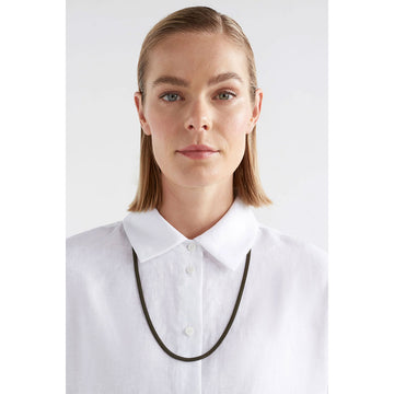 A long mesh chain style necklace in forest green.