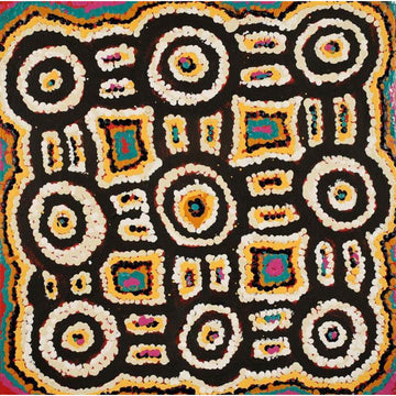 A square painting with white circles made from dots in a grid pattern with black outlines and yellow and green squares in between.