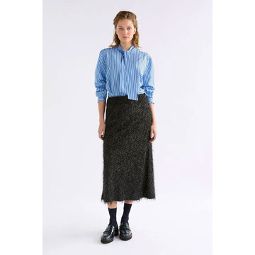 Black textured skirt on a white background.