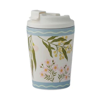 Travel mug with floral design on a white background.