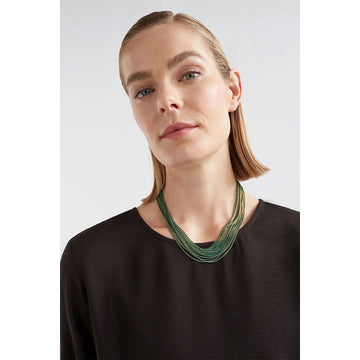 A necklace made up of multiple fine chains in bronze to create a thick strap.