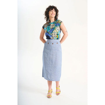 Light blue denim skirt with button details on a white background.