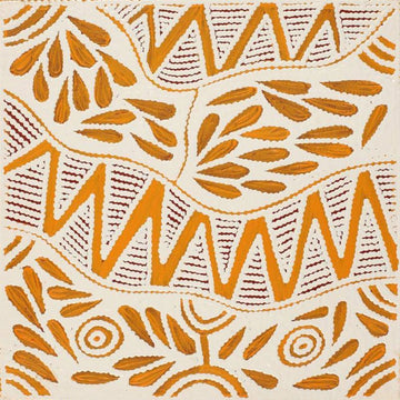 A square painting with yellow shapes including zig zags, leaves and circles on a white background.