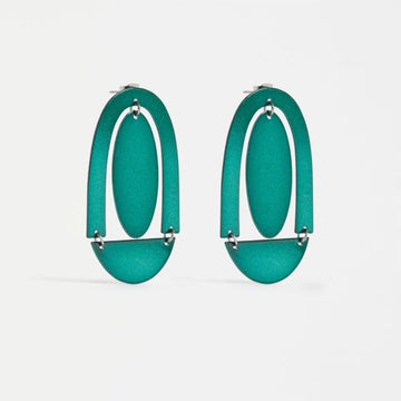 A pair of stud earrings with a large arch and circle shape in green.