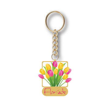 A keyring with a bunch of pink and yellow tulips charm hanging off the ring.
