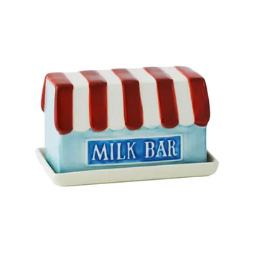 Butter dish with red and white striped roof and 'Milk Bar' sign on a white background.
