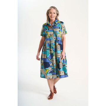 Colorful patterned dress on a white background.