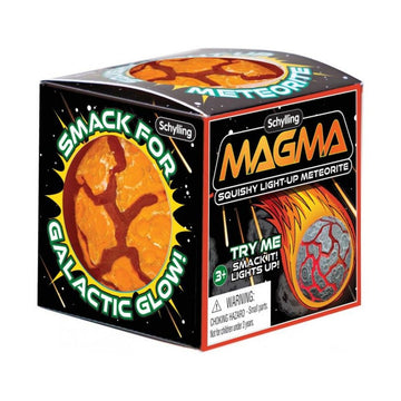 A cube box with the title 'Magma Squishy Light Up Meteorite' with photos of the ball inside decorated like a meteorite.