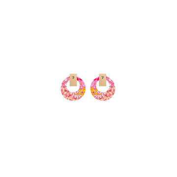 A pair of stud earrings shaped like circle outlines printed with pink floral artwork.
