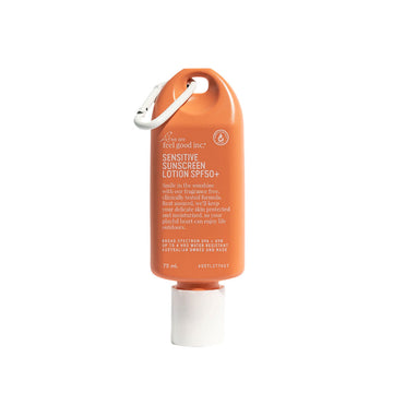 A small bottle of sunscreen in an orange container printed with white product information text on the front.
