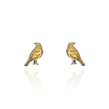 A pair of gold stud earrings shaped like magpies.