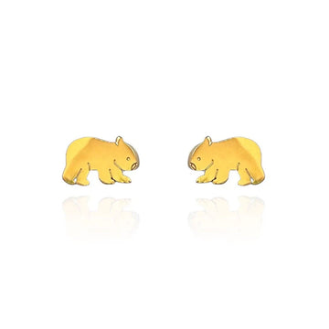 A pair of gold stud earrings shaped like wombats.