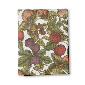 A folded up table cloth illustrated with fruits and leaves.