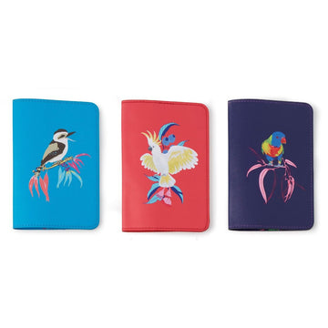Three passport wallets in different colours, each with a different Australian bird on the front.
