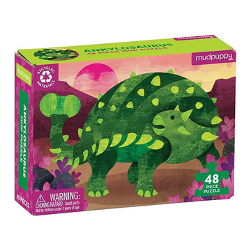 A puzzle box with an illustration of a green anklyosaurus.