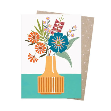 A greeting card with an illustration of a vase filled with flowers.