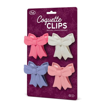 A set of four bow shaped clips attached to a card backing.