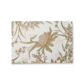 A folded up table runner illustrated with flowers.