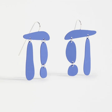 Pair of blue earrings on a white background.