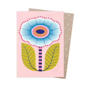 Greeting card with a colourful flower design on a pink background.