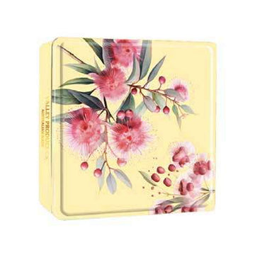 A yellow tin printed with gumnut blossoms.