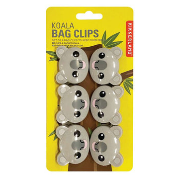 Six koala shaped bag clips attached to a yellow card with a picture of a tree trunk.