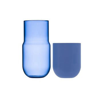 A blue glass carafe.