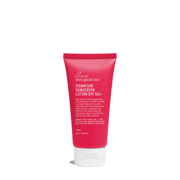 A pink tube of sunscreen with white text on the outside.
