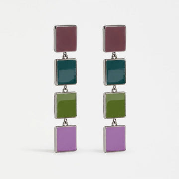 Colorful geometric earrings on a white background.