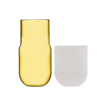 A yellow glass carafe.