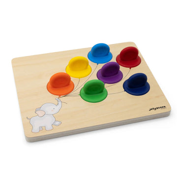 A wooden board with an illustration of an elephant holding seven coloured balloons from its trunk. There are coloured silicone pieces in place of the balloons.