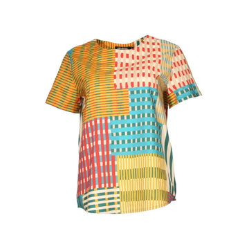 A women's short sleeve top with an abstract stripe pattern in yellow, blue and red.