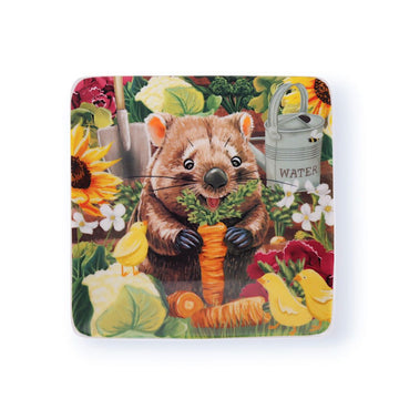 Square trinket tray with a cartoon quokka holding a carrot in a garden setting.