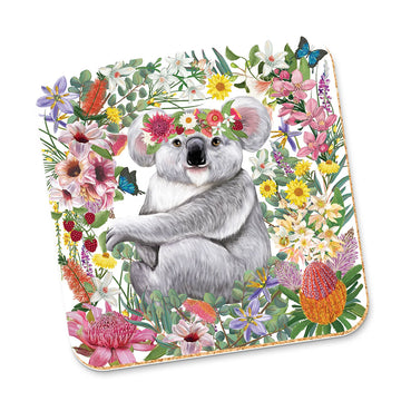 A square coaster illustrated with a koala wearing a flower crown surrounded by a background of flowers.