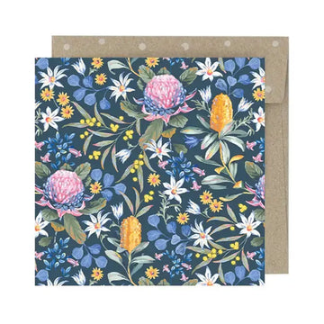 Floral patterned card with a brown envelope on a white background.